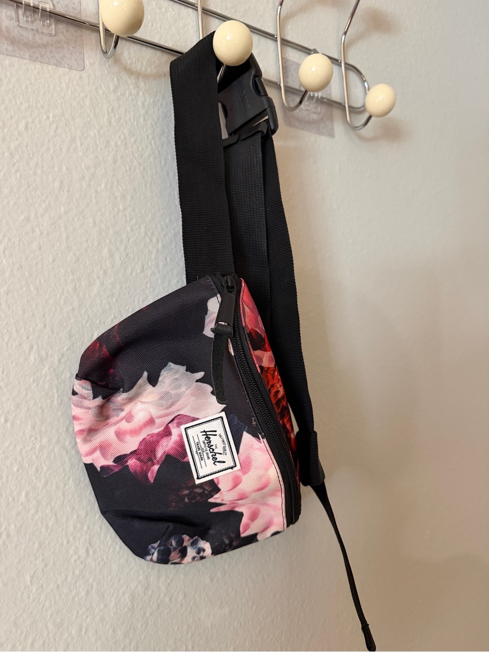 Herschel Supply Company Black Crossbody Sling with Pink Floral Print